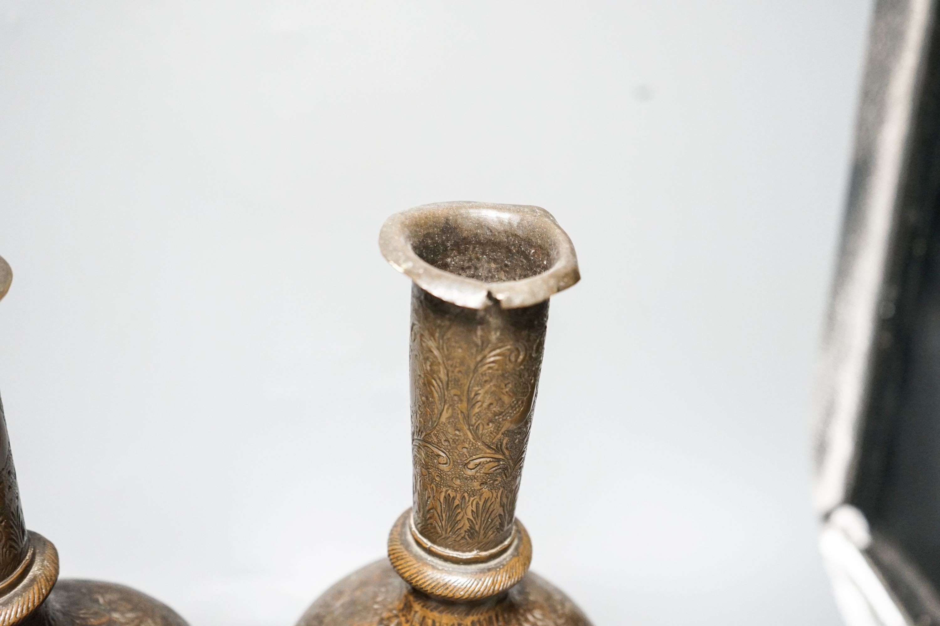 A pair of Persian engraved vases 32cm